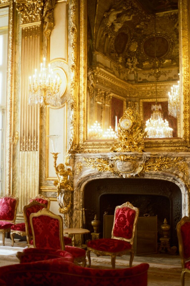 A lavish, golden room with ornate details.